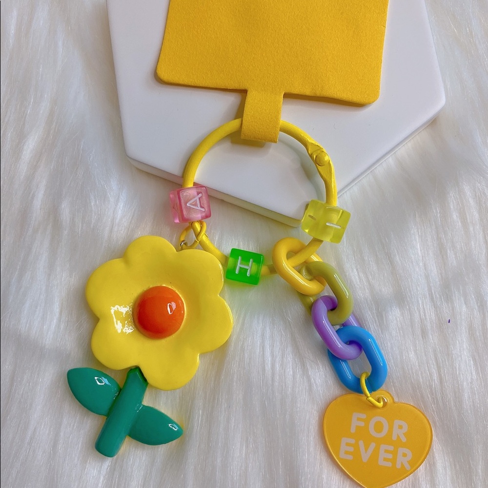 Yellow flower phone charm